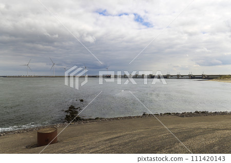 Wind turbines on edge of  national park Oosterschelde, Domburg - Vrouwenpolder, The Netherlands 111420143