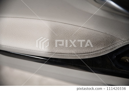 Before and after effect cleaning leather car upholstery in car  111420336