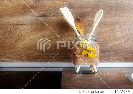 set of kitchen spatulas in the interior of the kitchen 111422029