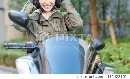  Woman riding a bike 111422161