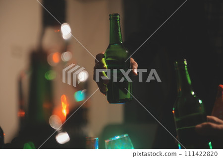 Celebration night, pour whiskey into a glass. Give to friends who come to celebrate Celebration night, pour whiskey into a glass. Give to friends who come to celebrate 111422820