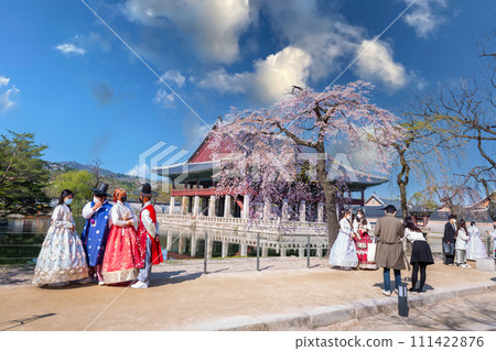 Korean couple with Korean traditional dress Hanbok in Gyeongbokgung palace in spring, seoul, south korea. 111422876