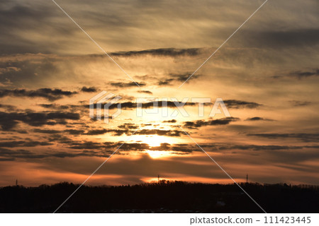 Sunshine shining through the clouds at dawn Sunshine shining through the clouds at dawn 111423445