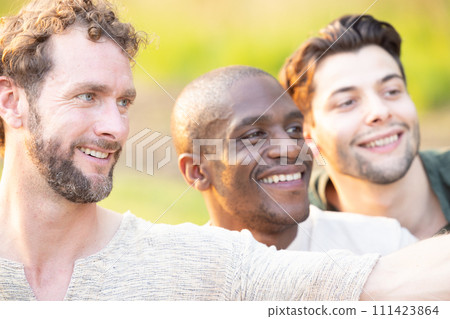 Friends Sharing a Joyful Moment Outdoors Friends Sharing a Joyful Moment Outdoors 111423864