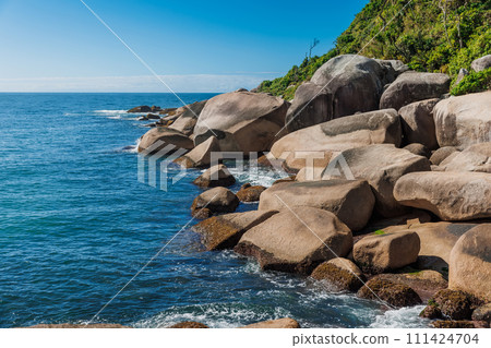 Coastline with granite rocks and quiet ocean in Brazil 111424704