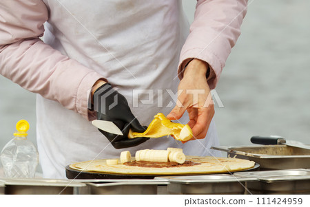 Making sweet pancakes in downtown Prague. Making sweet pancakes in downtown Prague. 111424959