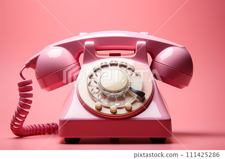 Retro rotary phone on pink background. Retro rotary phone on pink background. 111425286
