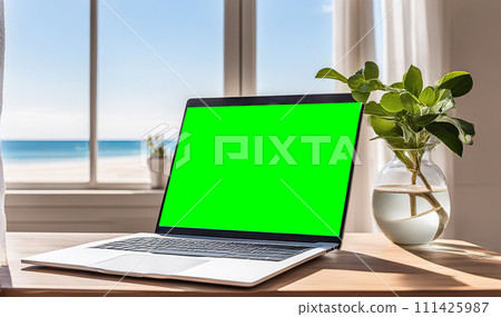 Laptop with green screen on a table by the beach with a tropical cocktail, palm trees, and ocean view portraying a relaxed work environment Laptop with green screen on a table by the beach with a tropical cocktail, palm trees, and ocean view portraying a relaxed work environment 111425987