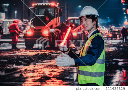 Security guard controlling traffic on the road 111426829