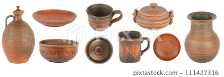 Collection of earthenware and ceramic dishes isolated on white. 111427316