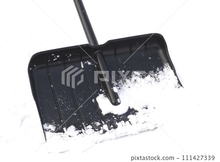 Snow removal, shovel, close-up. Winter. Snow removal, shovel, close-up. Winter. 111427339