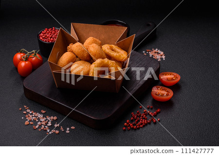 Delicious nuggets, rings and balls of mozzarella and parmesan cheese with salt and spices 111427777