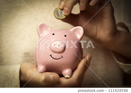 Girl preserve savings with piggy bank. Girl preserve savings with piggy bank. 111428598