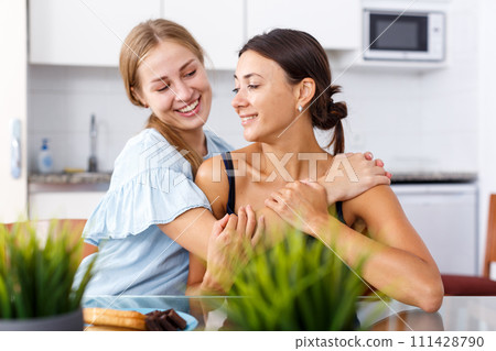 Portrait of two young friendly women 111428790