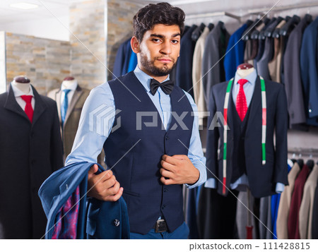Shopper is demonstrating image in waistcoat with butterfly Shopper is demonstrating image in waistcoat with butterfly 111428815