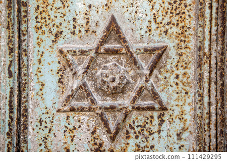 Star of David on old rusty door Star of David on old rusty door 111429295