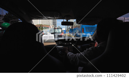 Inside the interior of a cab car in Jakarta. Indonesia. 111429402