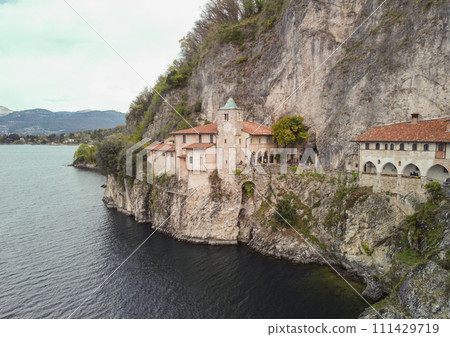 Drone view at the monastery of Santa Caterina del Sasso on lake Maggiore Italy Drone view at the monastery of Santa Caterina del Sasso on lake Maggiore Italy 111429719