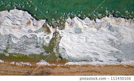 Drone shot of Georgian Bay Ice Pack Breaking Up and Melting in February when unseasonably warm 111430108