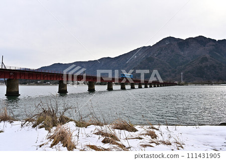 Yuragawa Bridge and train in winter Yuragawa Bridge and train in winter 111431905
