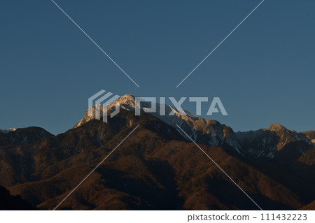 Mt. Kaikomagatake in the Southern Alps in the dawning harsh winter Mt. Kaikomagatake in the Southern Alps in the dawning harsh winter 111432223