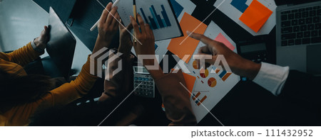 Business team collaboration discussing working analyzing with financial data and marketing growth report graph in team, presentation and brainstorming to strategy planning making profit of company. 111432952