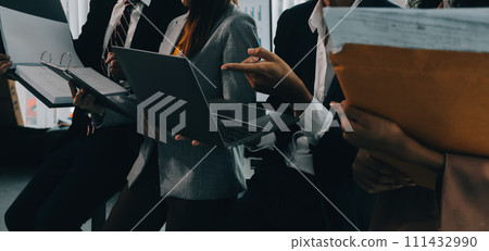 Co working conference, Business team meeting present, investor colleagues discussing new plan financial graph data on office table with laptop and digital tablet, Finance, accounting, investment. 111432990