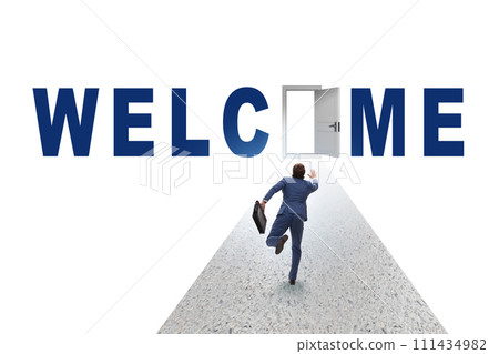 Businessman on the road leading to welcome sign 111434982