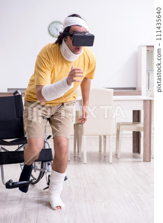 Young man after accident recovering at home 111435640
