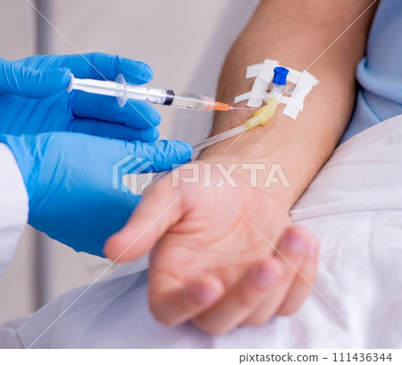 Male patient in blood transfusion concept 111436344