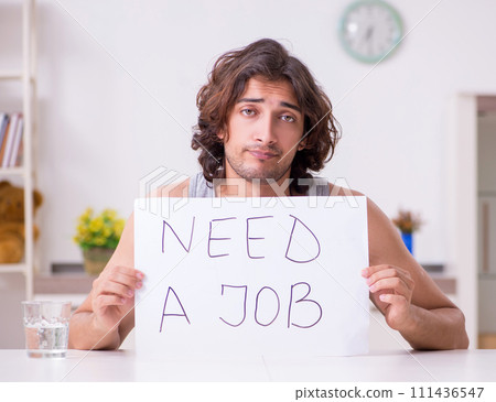 Unemployed man desperate at home Unemployed man desperate at home 111436547