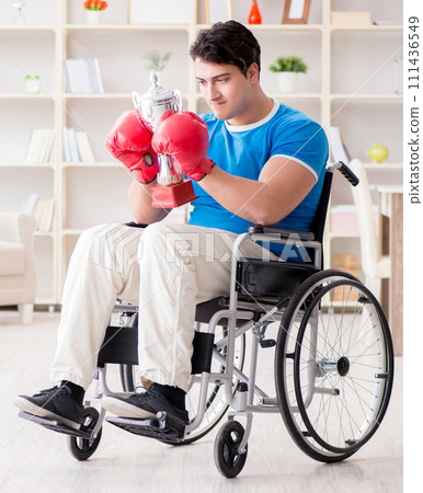 Disabled boxer at wheelchair recovering from injury Disabled boxer at wheelchair recovering from injury 111436549