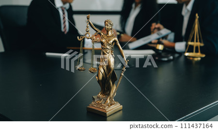Judge gavel with Justice lawyers having team meeting at law firm background. Concepts of Law and Legal services. Judge gavel with Justice lawyers having team meeting at law firm background. Concepts of Law and Legal services. 111437164