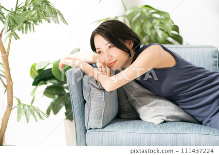 woman napping on the sofa woman napping on the sofa 111437224