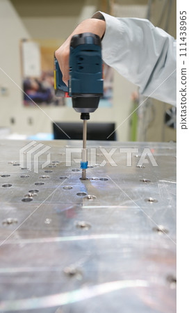 Workers inspecting at the factory Workers inspecting at the factory 111438965