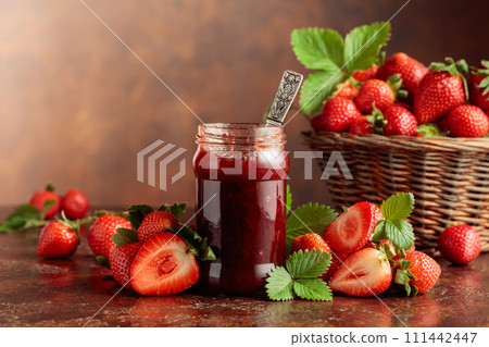 Strawberry jam and fresh berries. 111442447