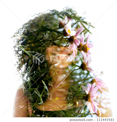 A full-front double exposure floral portrait of a young smiling woman 111443591