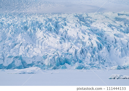 Iceland. Ice as a background. Vatnajokull National Park. Panoramic view of the ice lagoon. 111444133
