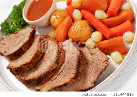 roast beef with dipping sauce and winter veggies roast beef with dipping sauce and winter veggies 111444816