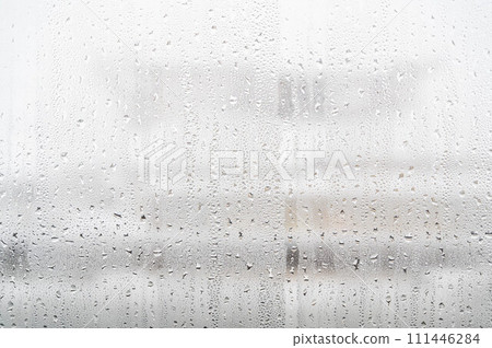 Condensation on the windowsill in winter Condensation on the windowsill in winter 111446284