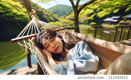Take a nap in a hammock Take a nap in a hammock 111448432