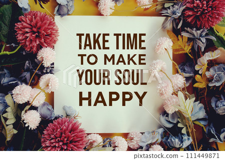 "Take time to Make Your Soul Happy" Inspirational quotes text message with flower decoration on yellow background 111449871