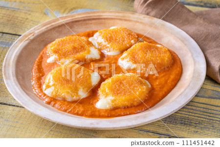 Nuggets with melted camembert 111451442