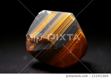 Walfordite is a rare precious natural stone on a black background. AI generated. Walfordite is a rare precious natural stone on a black background. AI generated. 111451804