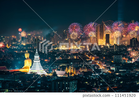 Bangkok night scene with big buddha in temple and firework display show over department store in crowded downtown 111451920