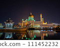 Illuminated mosque reflected in the water 111452232