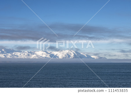 Atlantic ocean and snowy mountains, North Iceland Atlantic ocean and snowy mountains, North Iceland 111453835