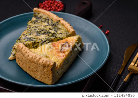 Delicious crispy quiche cut into slices with cheese, broccoli, tomatoes Delicious crispy quiche cut into slices with cheese, broccoli, tomatoes 111454056