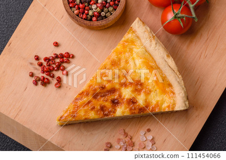Delicious crispy quiche cut into slices with cheese, broccoli, tomatoes Delicious crispy quiche cut into slices with cheese, broccoli, tomatoes 111454066