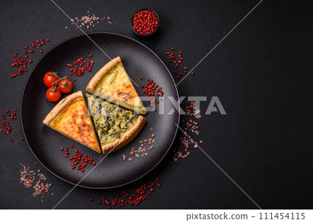 Delicious crispy quiche cut into slices with cheese, broccoli, tomatoes, salt, spices and herbs Delicious crispy quiche cut into slices with cheese, broccoli, tomatoes, salt, spices and herbs 111454115